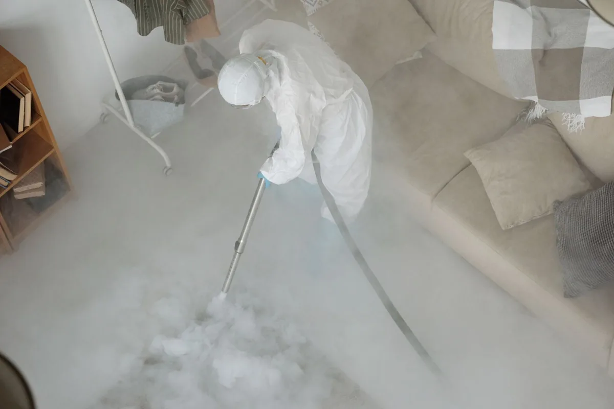Biohazard cleanup technician in protective equipment, Frenchtown, NJ